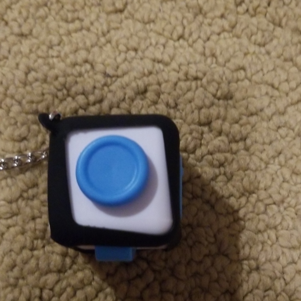 Blue fidget cube with case